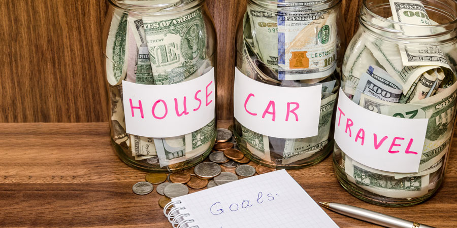 Jars of money saved with Valley FCU